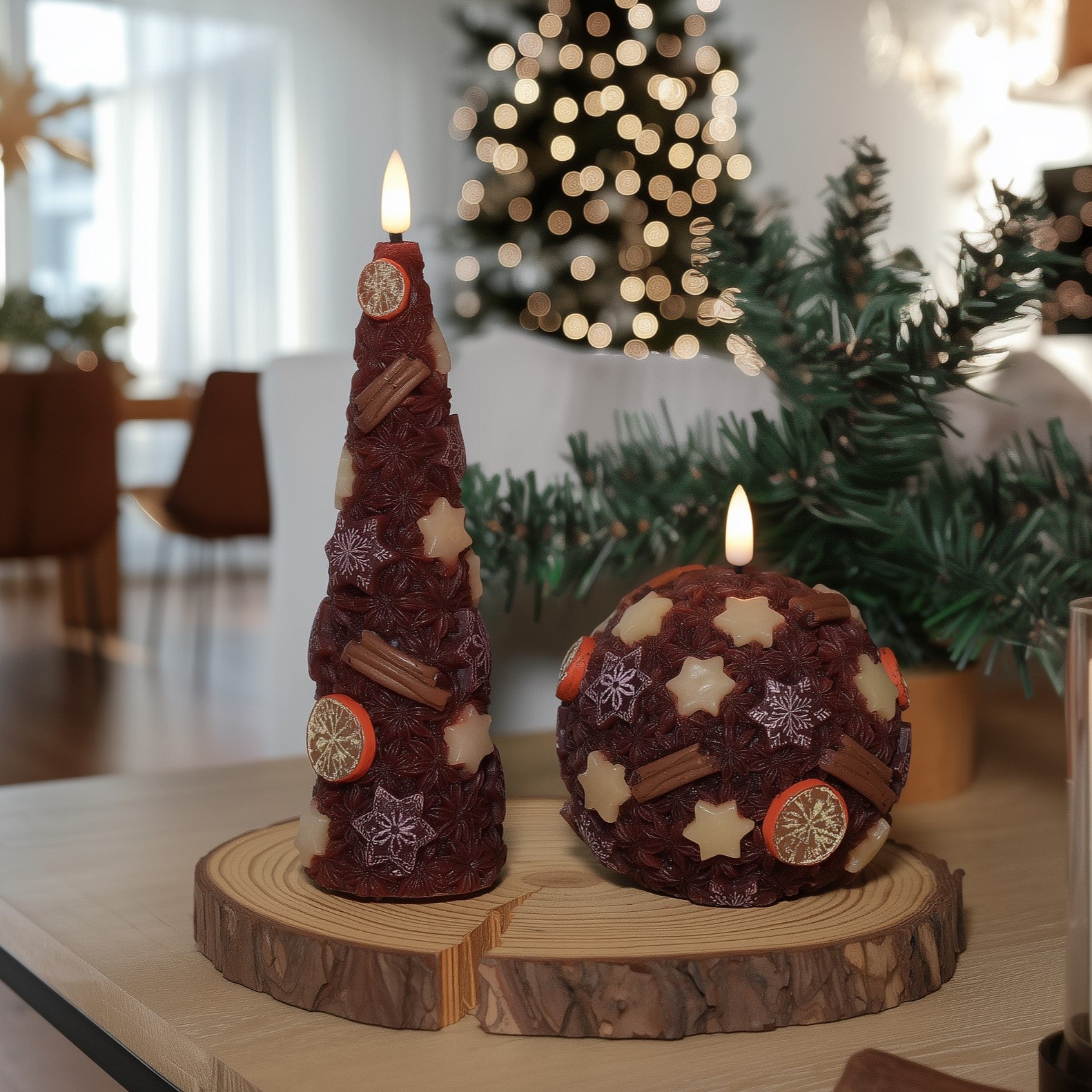 Decorative candles on a wooden base with a Christmas tree in the background