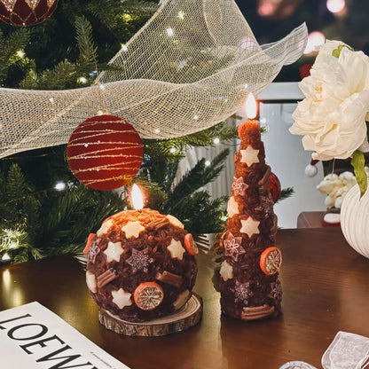 Decorative candles on a wooden base with a Christmas tree in the background