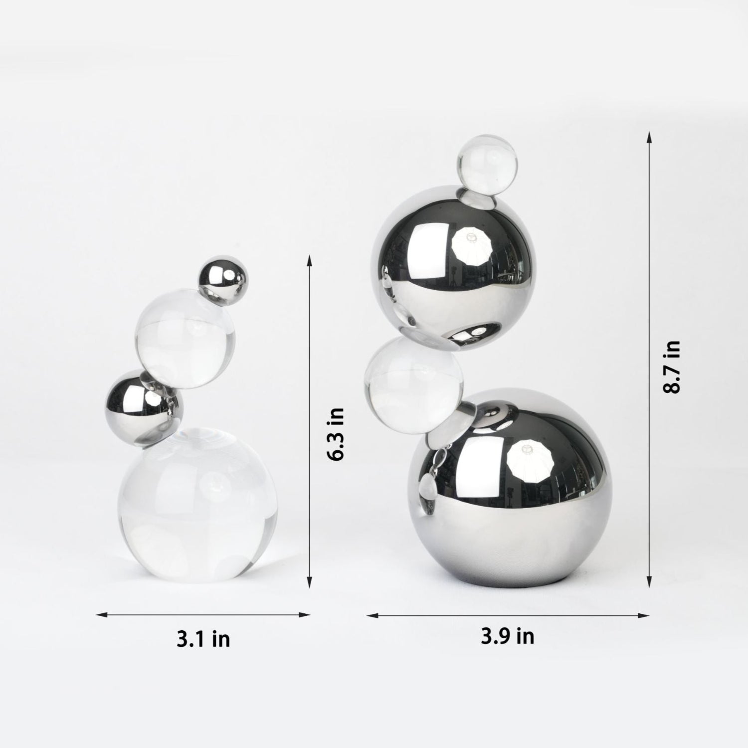 Set of silver spherical decorations with dimensions on a white background