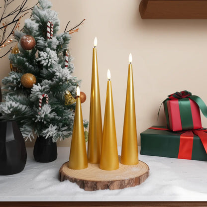 Decorative setup with gold candles, greenery, and a vase with yellow flowers on a table.