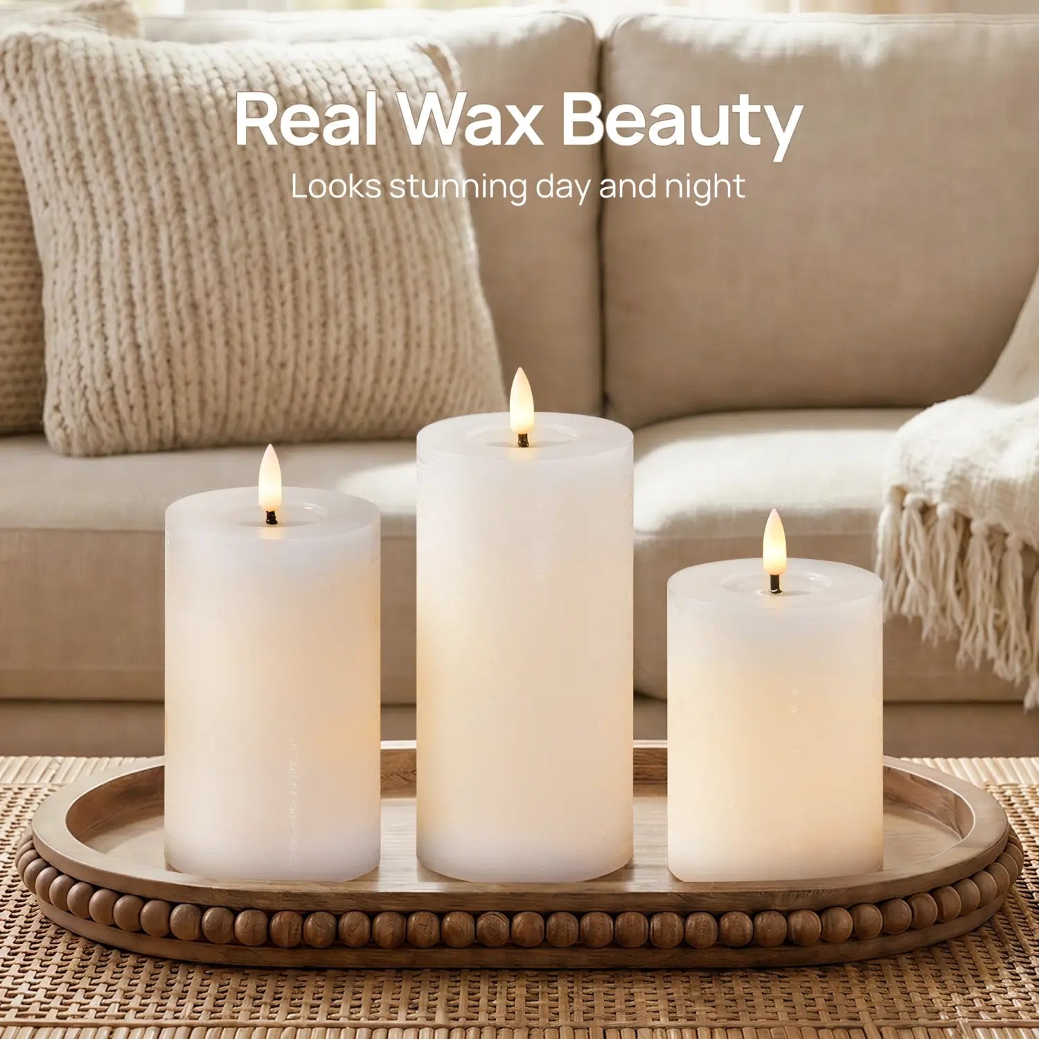 Three white candles on a wooden tray with a couch in the background, labeled 'Real Wax Beauty'.